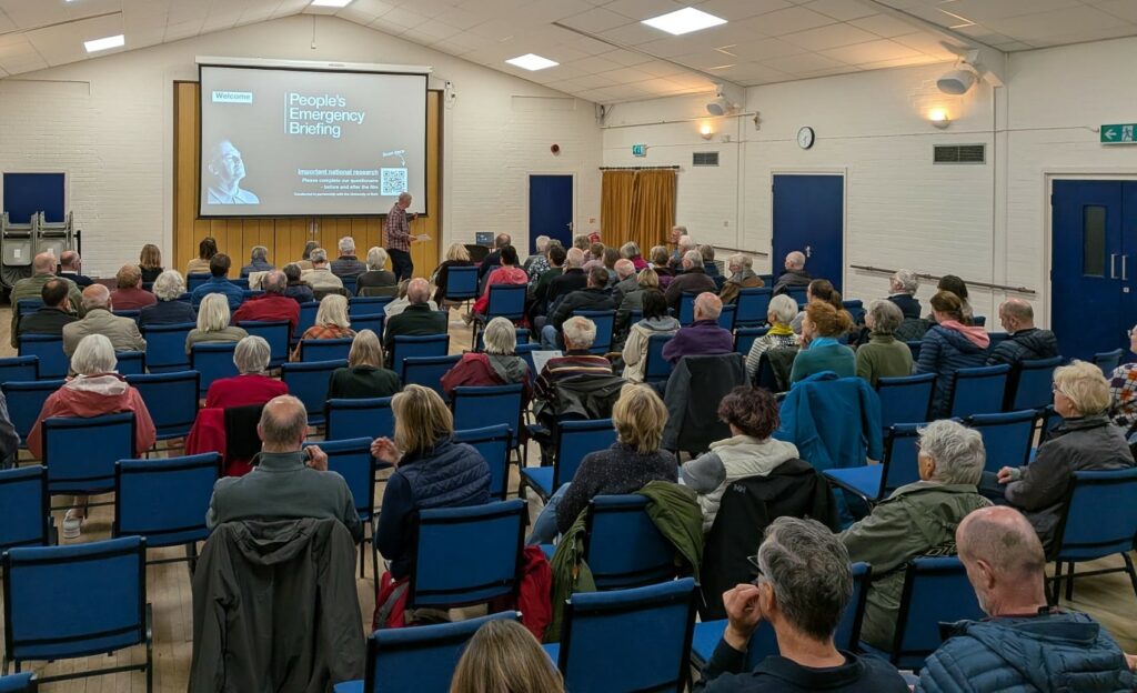 People attending the People's Emergency Briefing film at Haddenham Village Hall on 14 May 2026